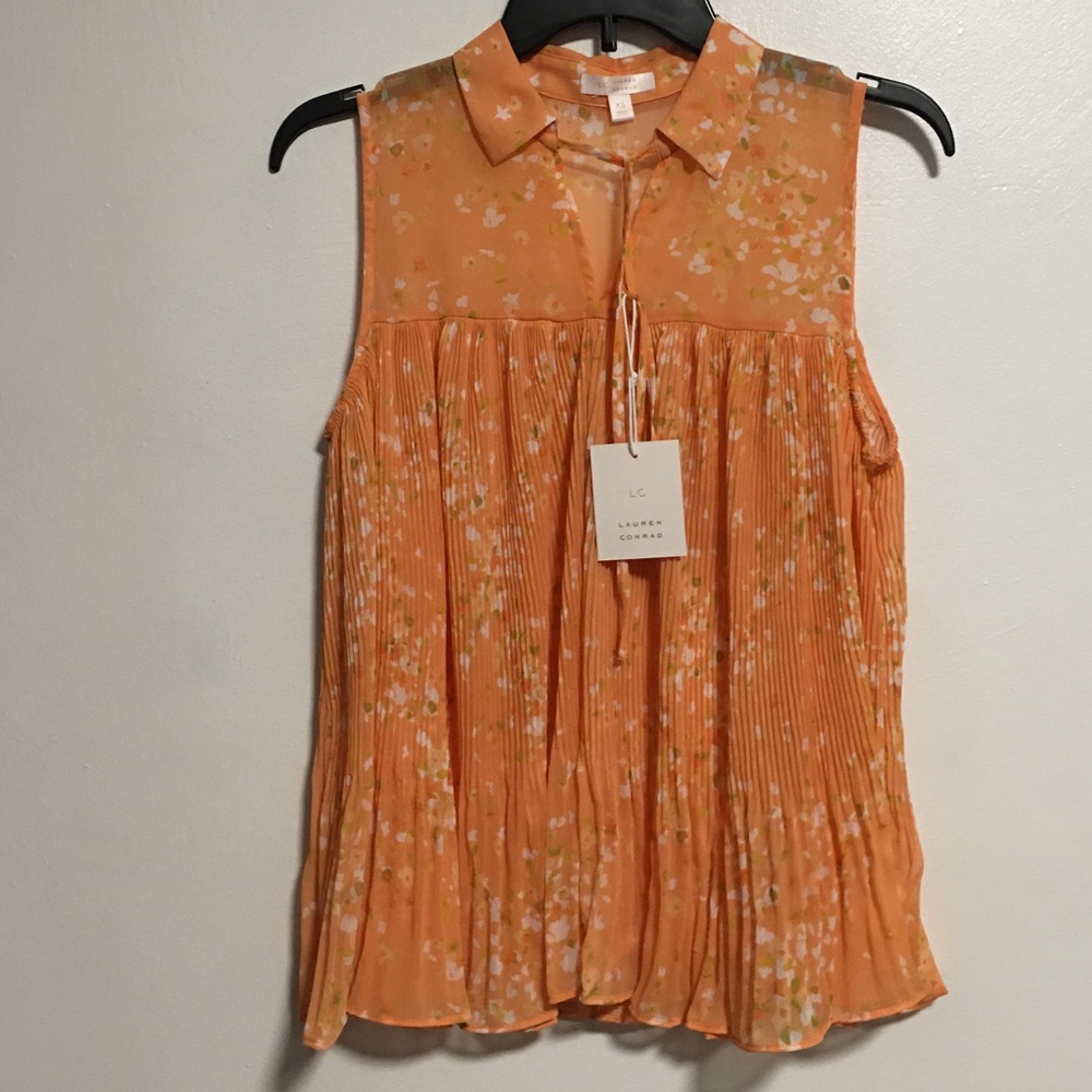NEW Orange shirt with white flower detailing